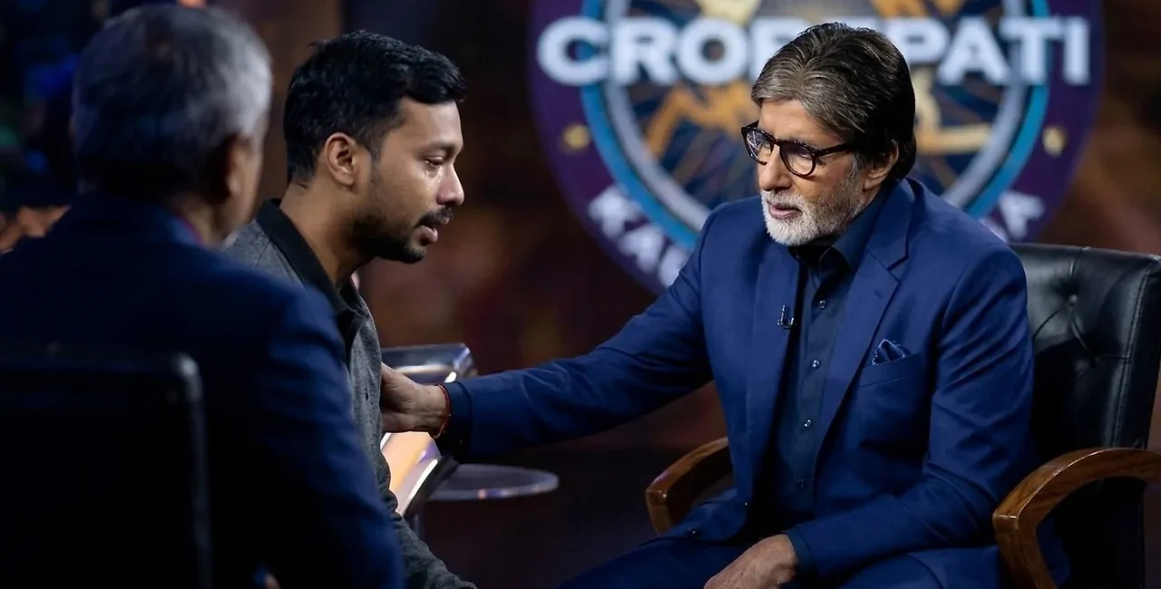 Amitabh Bachchan listens to an emotional contestant on KBC 18