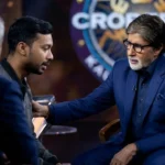 Amitabh Bachchan listens to an emotional contestant on KBC 18